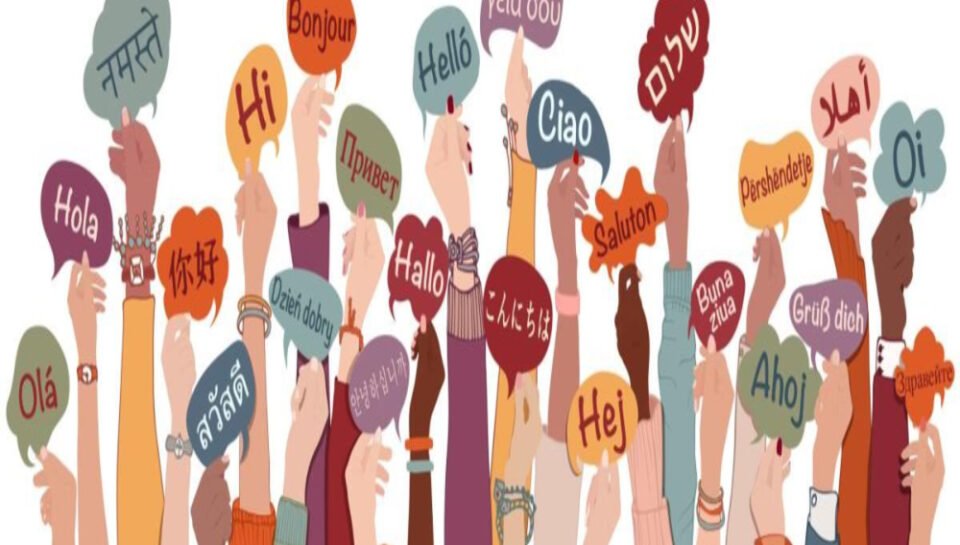 Briefly discuss the challenges of designing signs for multilingual audiences. Hello InTech